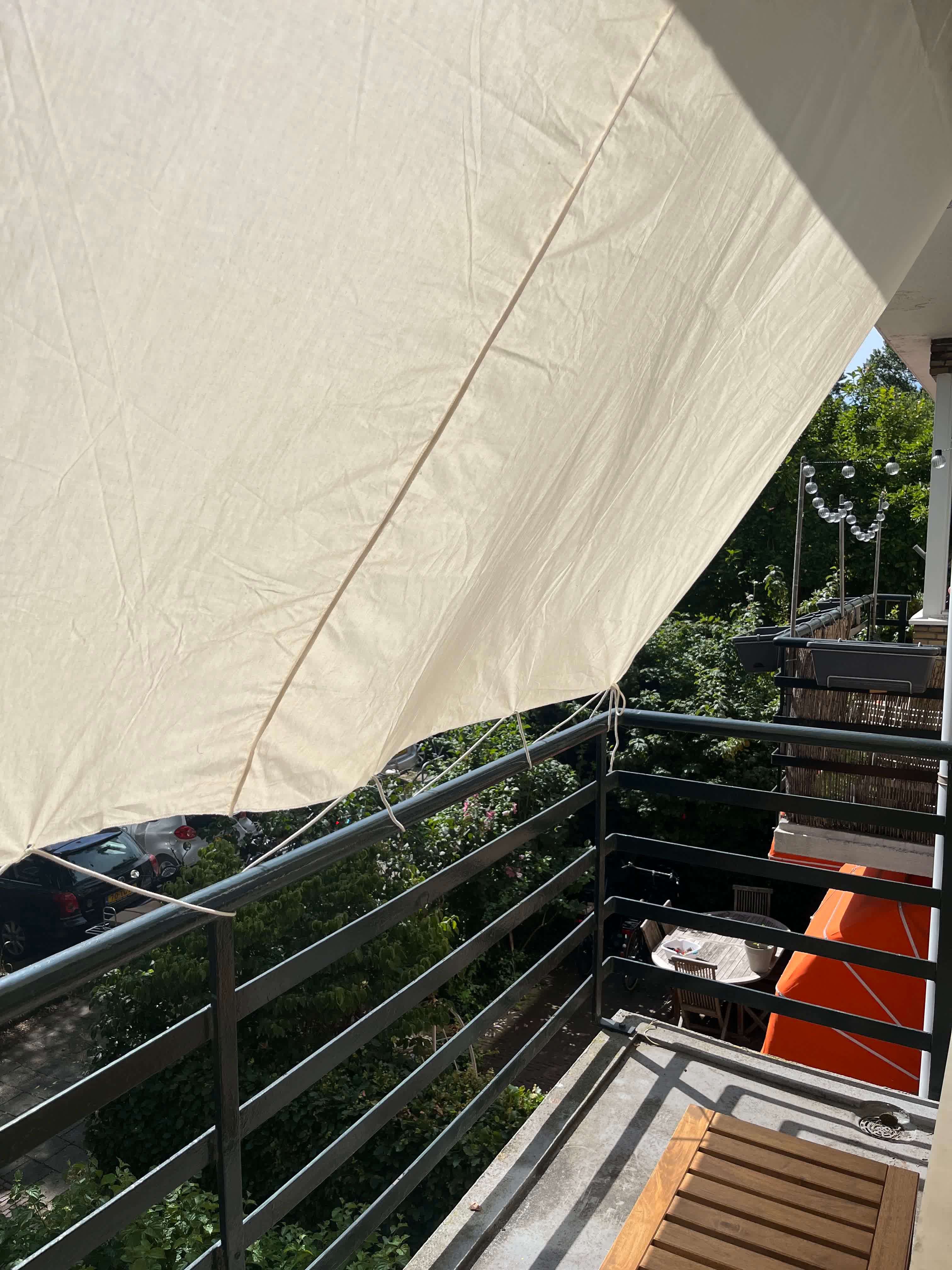 Photo taken on a balcony with a sun awning attached to it
